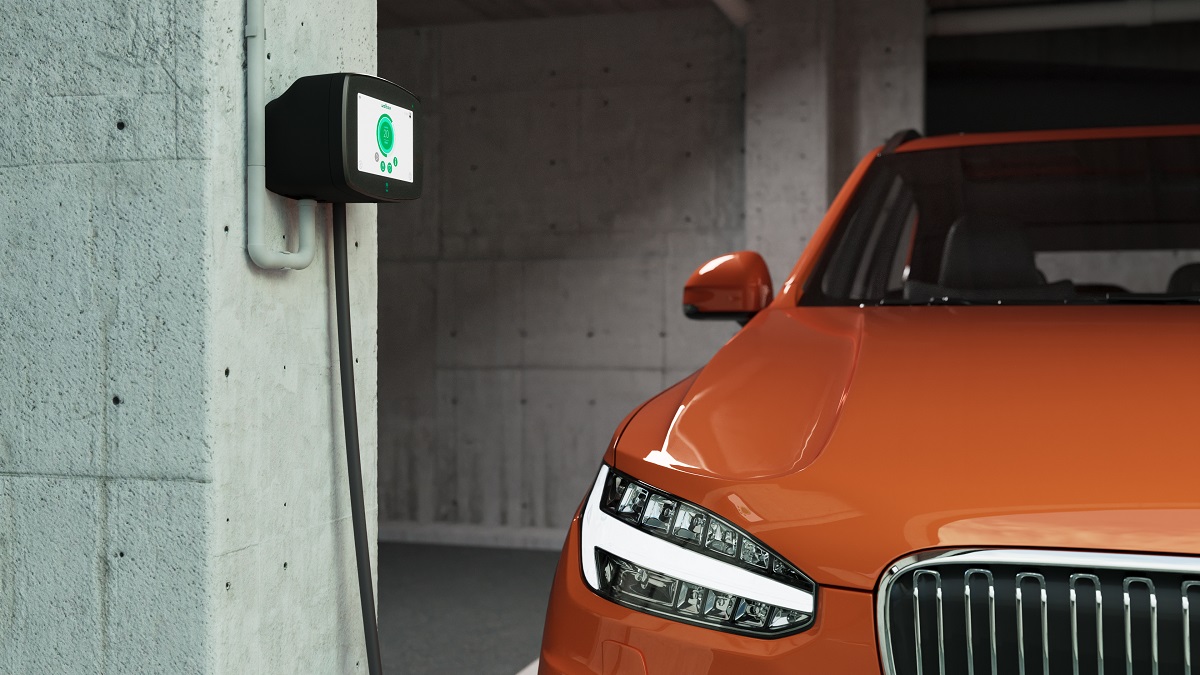 Wallbox ev charger in condo with orange ev